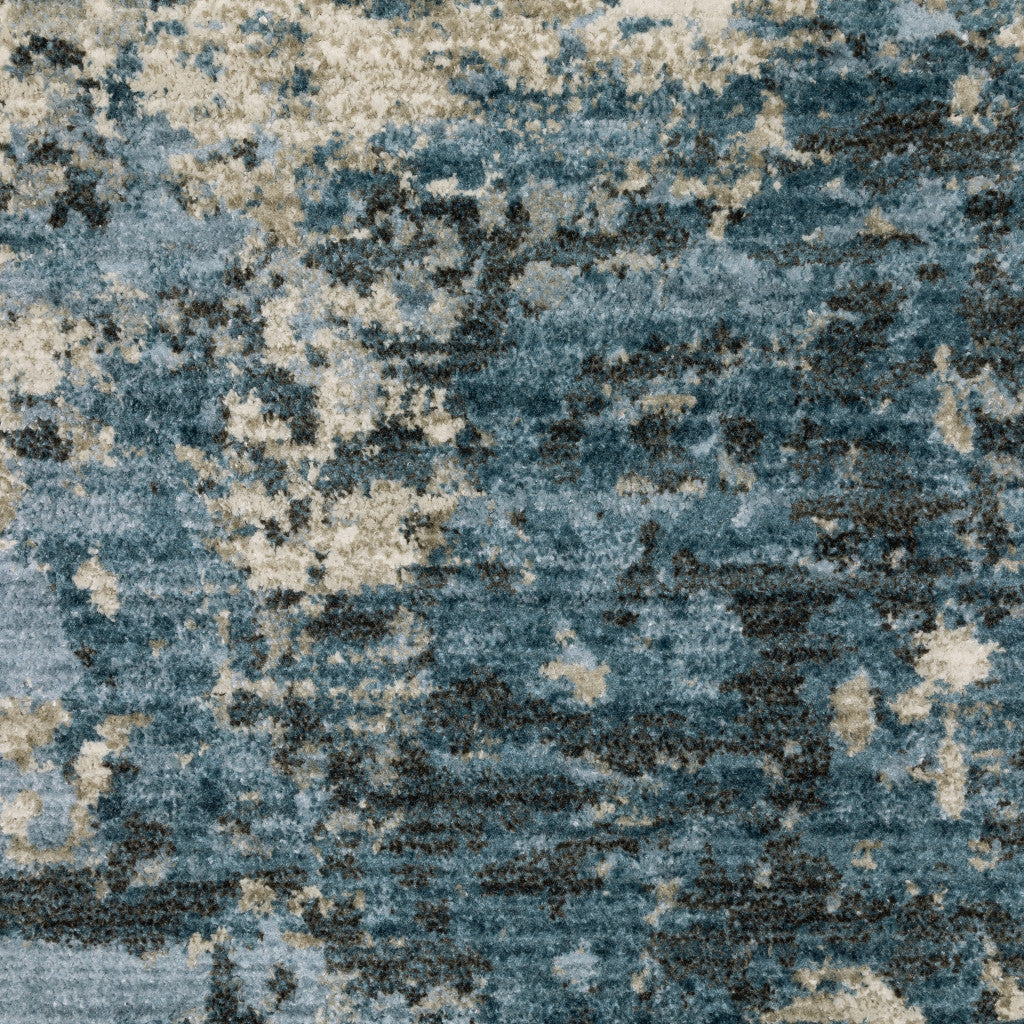 8' X 11' Blue Grey Ivory Light Blue And Dark Blue Abstract Power Loom Stain Resistant Area Rug With Fringe