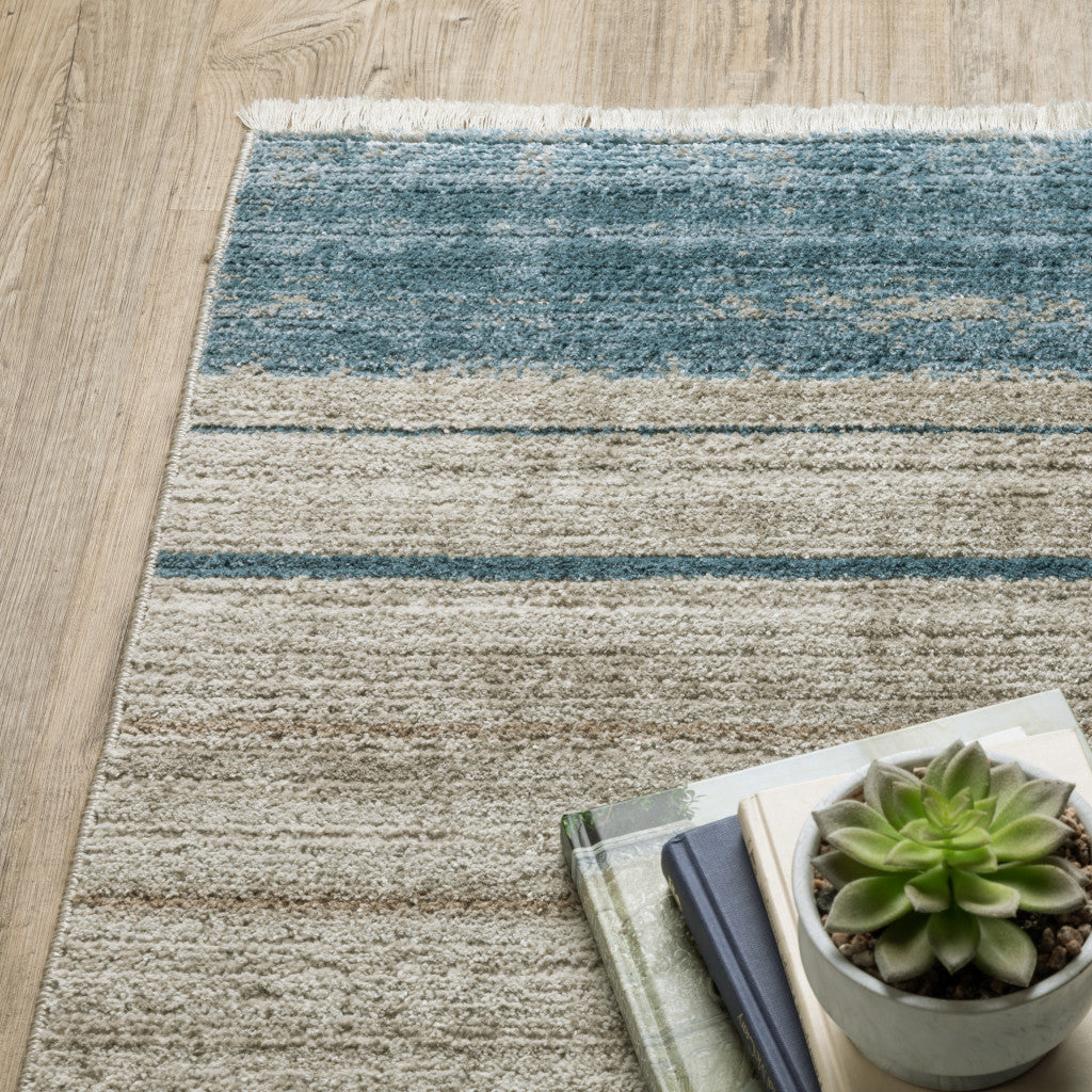 8' Blue Dark Blue Teal Grey Ivory Beige And Tan Geometric Power Loom Runner Rug With Fringe