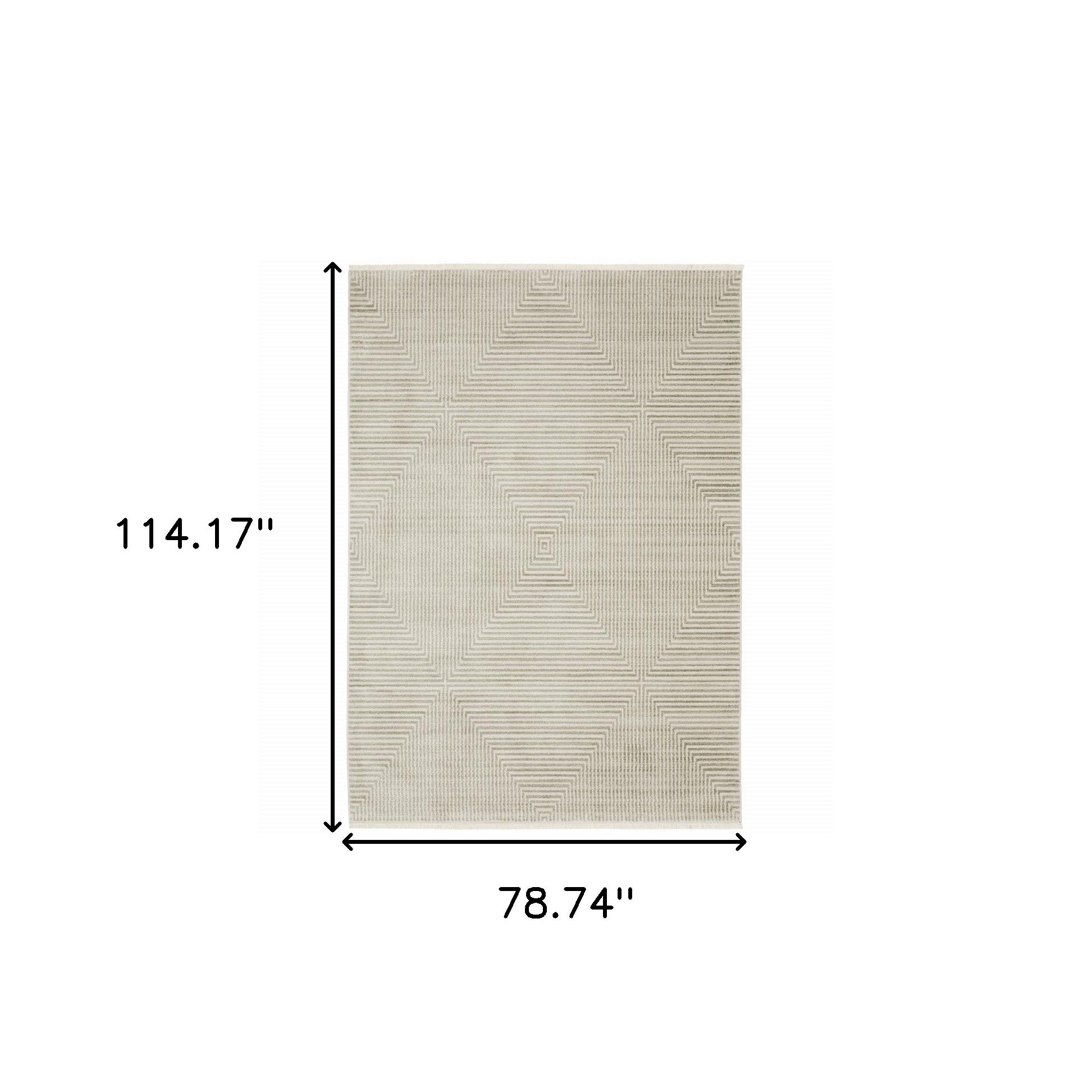 6' X 9' Ivory Beige Taupe And Tan Geometric Power Loom Stain Resistant Area Rug With Fringe