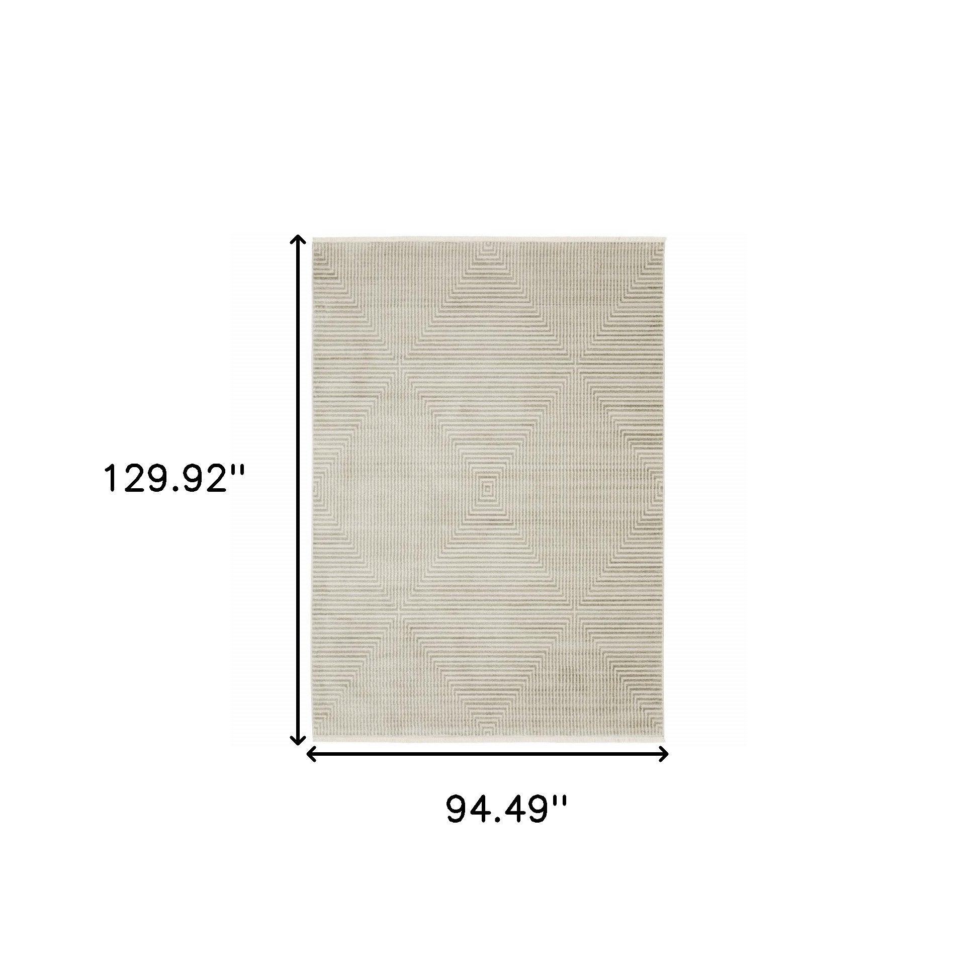 8' X 11' Ivory Beige Taupe And Tan Geometric Power Loom Stain Resistant Area Rug With Fringe