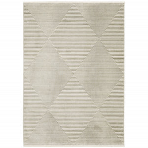 8' X 11' Ivory Beige Taupe And Tan Geometric Power Loom Stain Resistant Area Rug With Fringe