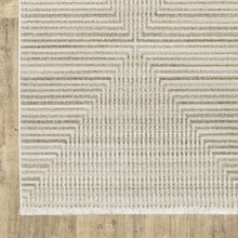 8' X 11' Ivory Beige Taupe And Tan Geometric Power Loom Stain Resistant Area Rug With Fringe