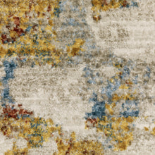 6' X 9' Beige Grey Gold Blue Rust And Teal Abstract Power Loom Stain Resistant Area Rug With Fringe