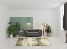 6' X 9' Grey Gold Black Charcoal And Beige Abstract Power Loom Stain Resistant Area Rug With Fringe