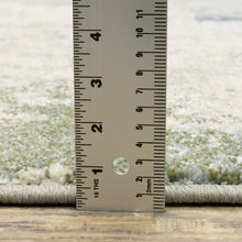 2' X 8' Blue Green Grey And Ivory Abstract Power Loom Stain Resistant Runner Rug