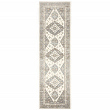 2' X 8' Grey Pink And Brown Oriental Power Loom Stain Resistant Runner Rug