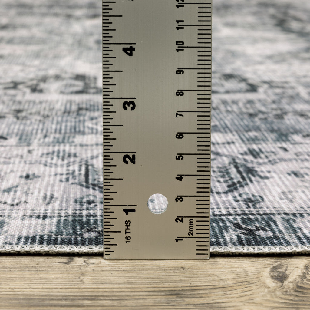 2' X 3' Navy Blue Ivory And Grey Oriental Printed Stain Resistant Non Skid Area Rug