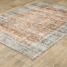4' X 6' Rust Blue Ivory And Gold Oriental Printed Stain Resistant Non Skid Area Rug