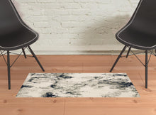 2' X 3' Grey Black And Ivory Abstract Power Loom Stain Resistant Area Rug