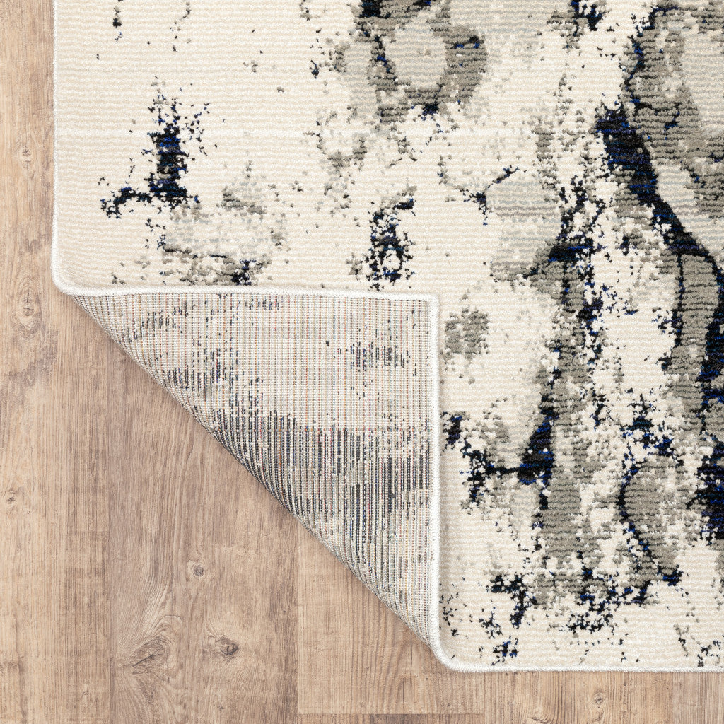 5' X 7' Grey Black And Ivory Abstract Power Loom Stain Resistant Area Rug