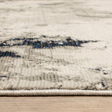 6' X 9' Grey Black And Ivory Abstract Power Loom Stain Resistant Area Rug