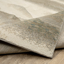 8' X 10' Grey Blue And Teal Abstract Power Loom Stain Resistant Area Rug