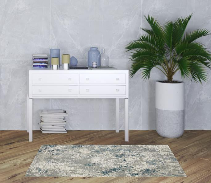 3' X 5' Blue Beige And Teal Abstract Power Loom Stain Resistant Area Rug