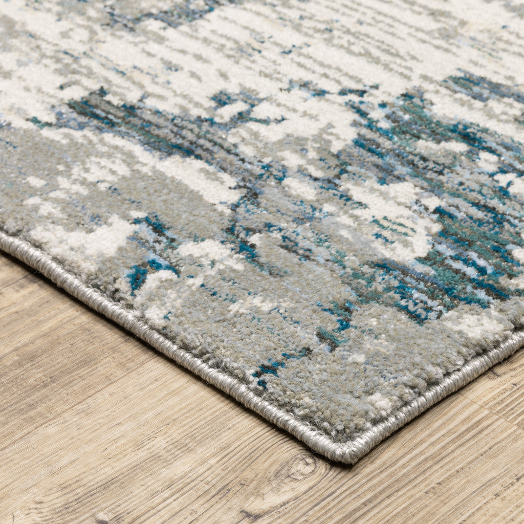 8' X 10' Blue Beige And Teal Abstract Power Loom Stain Resistant Area Rug