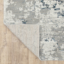 8' X 10' Blue Beige And Teal Abstract Power Loom Stain Resistant Area Rug