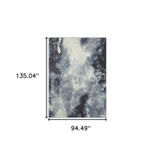 8' X 10' Navy And Ivory Abstract Power Loom Stain Resistant Area Rug