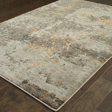2' X 3' Grey And Gold Abstract Power Loom Stain Resistant Area Rug