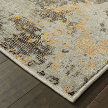 3' X 5' Grey And Gold Abstract Power Loom Stain Resistant Area Rug