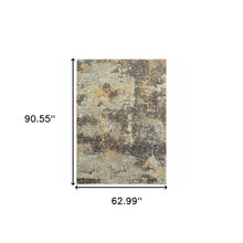 5' X 7' Grey And Gold Abstract Power Loom Stain Resistant Area Rug