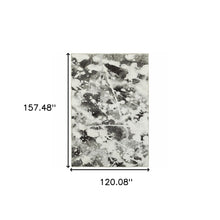 10' X 13' Charcoal And White Abstract Power Loom Stain Resistant Area Rug