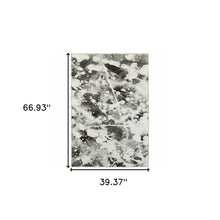 3' X 5' Charcoal And White Abstract Power Loom Stain Resistant Area Rug