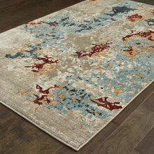 6' X 9' Beige And Blue Abstract Power Loom Stain Resistant Area Rug