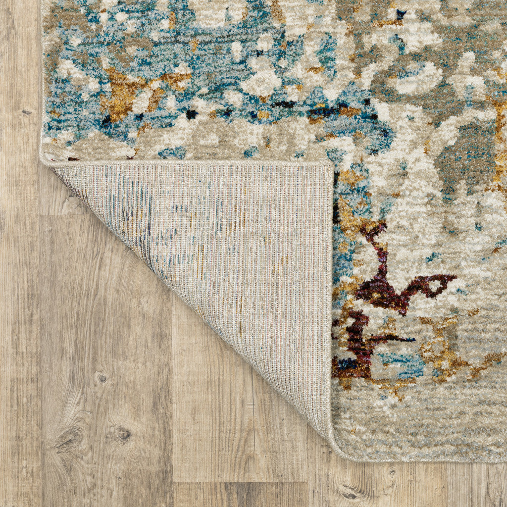 9' X 12' Beige And Blue Abstract Power Loom Stain Resistant Area Rug