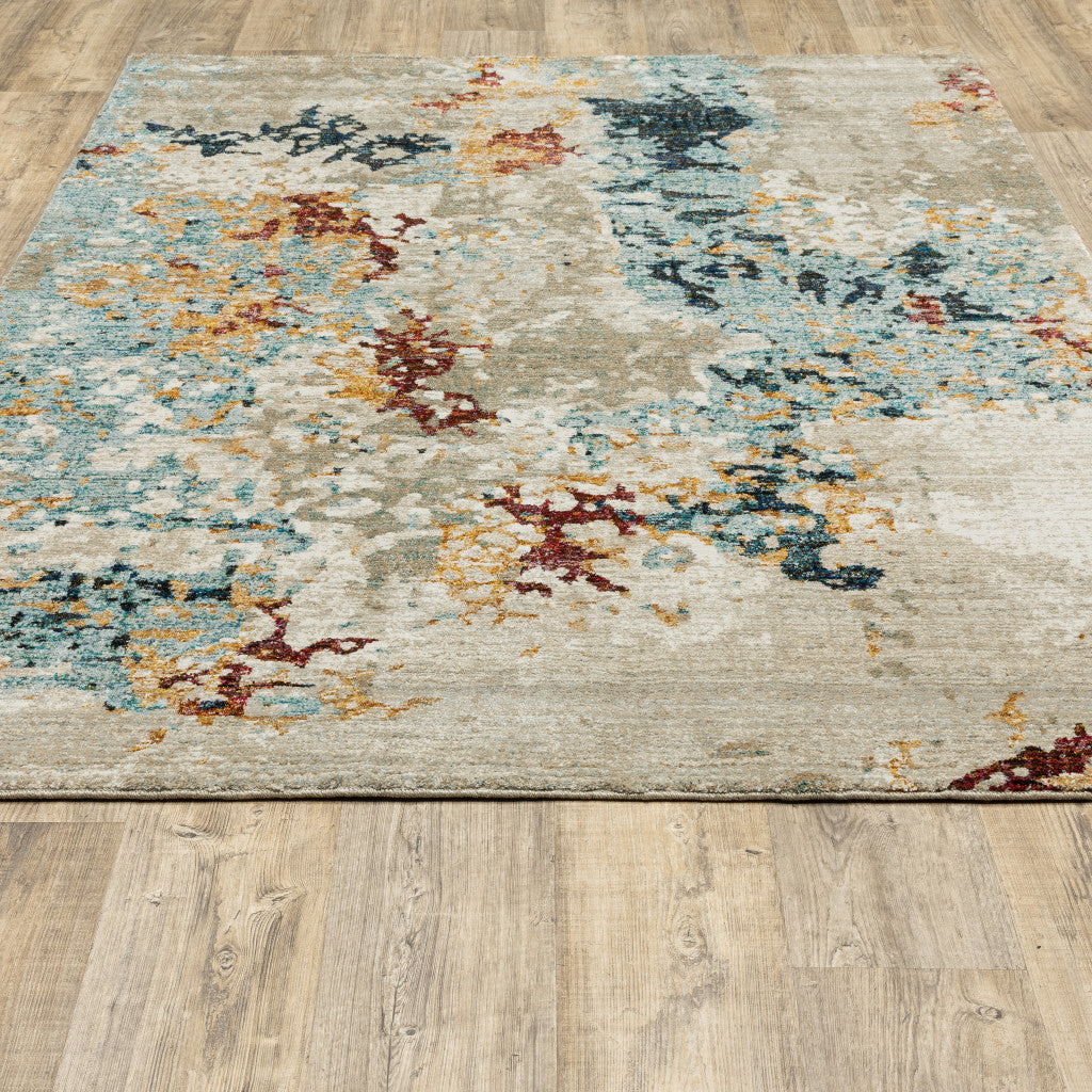 9' X 12' Beige And Blue Abstract Power Loom Stain Resistant Area Rug