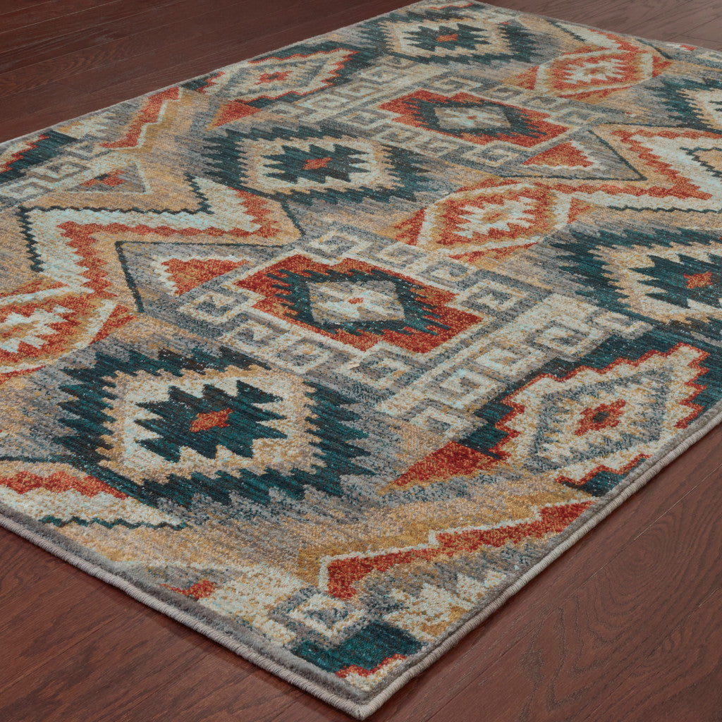 5' X 8' Blue Teal Grey Orange Gold Ivory And Rust Geometric Power Loom Stain Resistant Area Rug