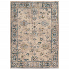 5' X 8' Ivory Blue Gold And Grey Oriental Power Loom Stain Resistant Area Rug