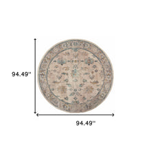 8' Ivory Blue Gold And Grey Round Oriental Power Loom Stain Resistant Area Rug