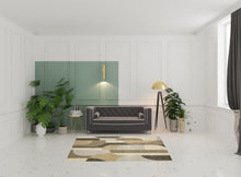 5' X 7' Brown And Ivory Geometric Power Loom Area Rug