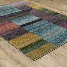 9' X 12' Purple Blue Teal Gold Green Red And Pink Geometric Power Loom Stain Resistant Area Rug