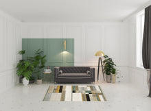 5' X 7' Beige Gold Black Grey Tan Teal And Rust Geometric Power Loom Area Rug