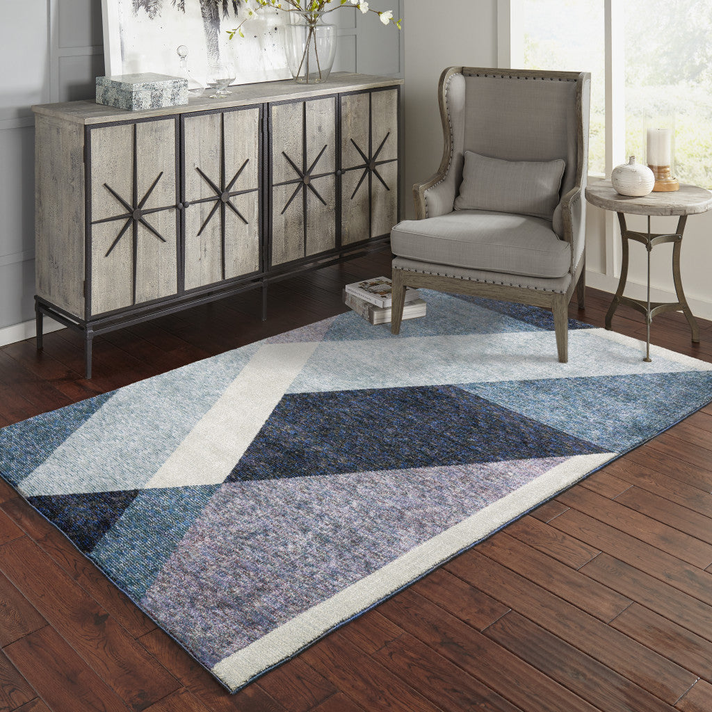 7' X 10' Blue Purple Grey And Teal Geometric Power Loom Area Rug