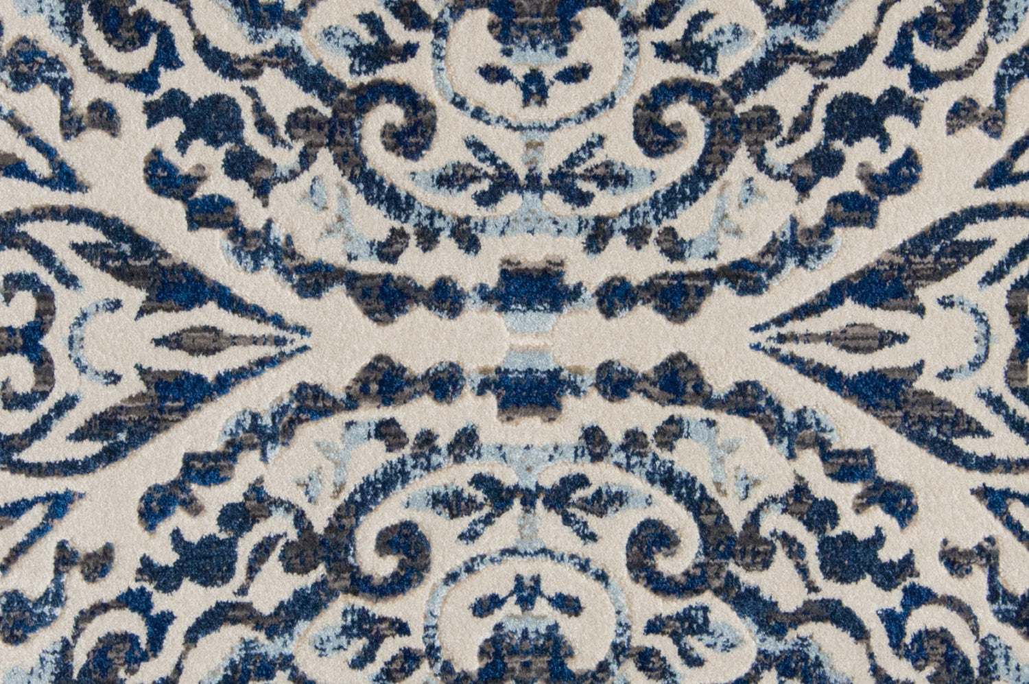 Blue Ivory And Black Floral Distressed Stain Resistant Area Rug - 2' X 4'