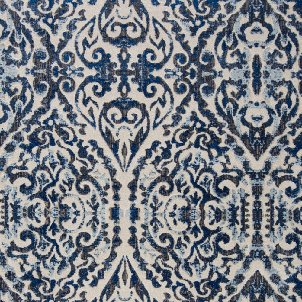 Blue Ivory And Black Floral Distressed Stain Resistant Area Rug - 2' X 4'