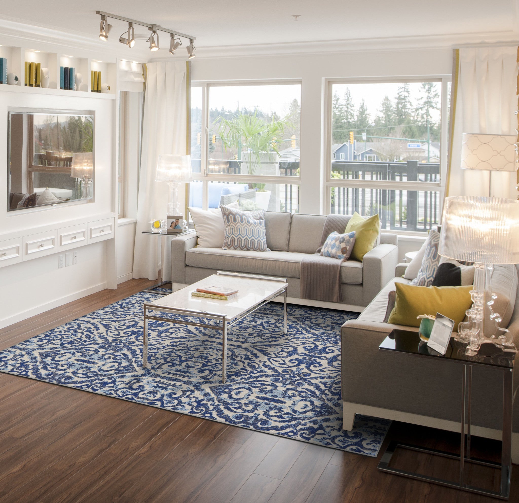 Blue Ivory And Black Floral Distressed Stain Resistant Area Rug - 2' X 4'