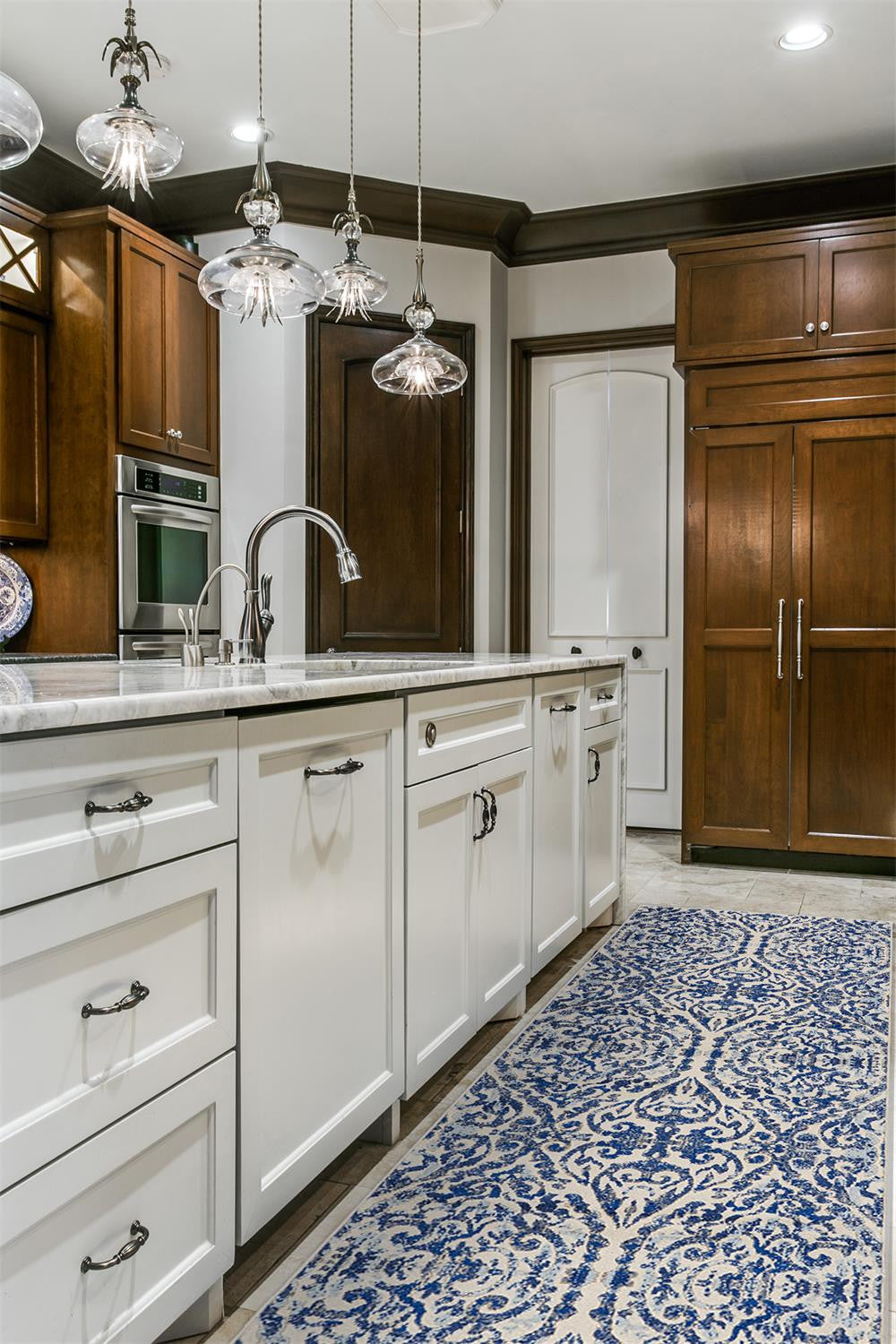 Blue Ivory And Black Floral Distressed Stain Resistant Area Rug - 2' X 4'