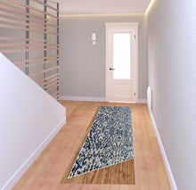 Blue Ivory And Black Floral Distressed Stain Resistant Area Rug - 2' X 4'