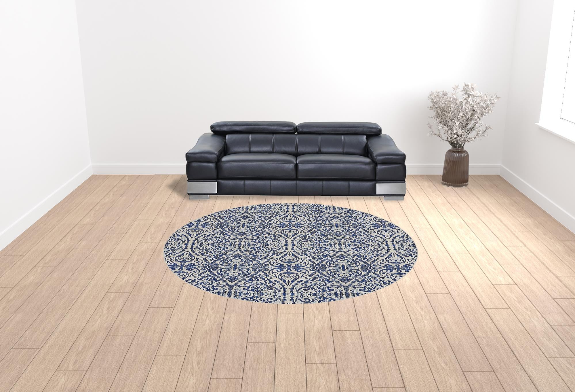 Blue Ivory And Black Floral Distressed Stain Resistant Area Rug - 2' X 4'