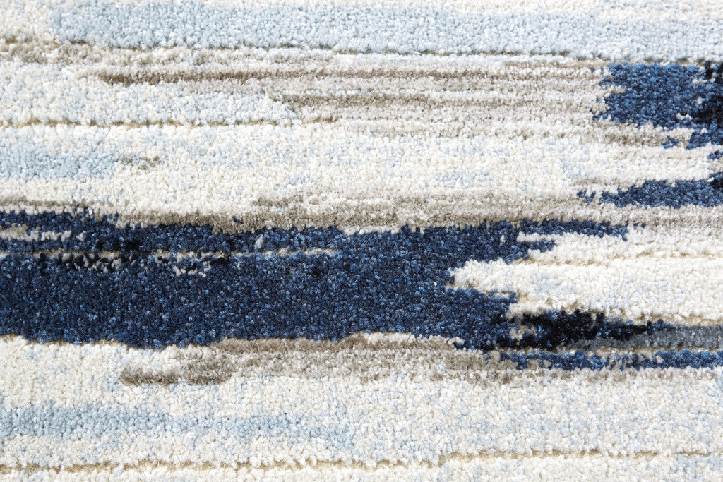 2' X 4' Ivory Blue And Gray Abstract Distressed Area Rug