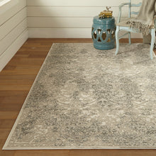 5' X 8' Ivory Gray And Black Abstract Stain Resistant Area Rug