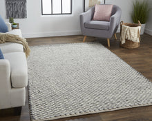 4' X 6' Gray And Ivory Wool Floral Hand Woven Stain Resistant Area Rug