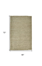 4' X 6' Tan And Gray Hand Woven Area Rug
