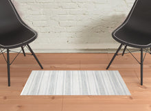 4' X 6' Blue Gray And Ivory Striped Hand Woven Area Rug