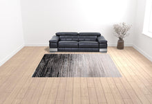 4' X 6' Black And Dark Gray Abstract Area Rug