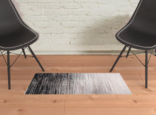 4' X 6' Black And Dark Gray Abstract Area Rug