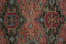 9' X 12' Red Orange And Blue Wool Floral Hand Knotted Distressed Stain Resistant Area Rug With Fringe