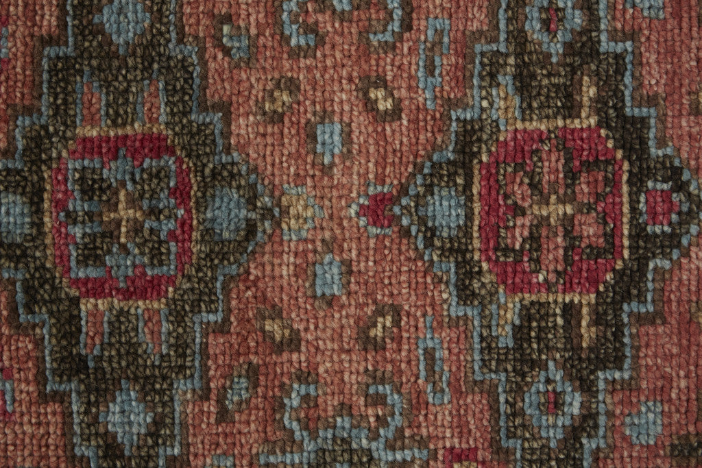 9' X 12' Red Orange And Blue Wool Floral Hand Knotted Distressed Stain Resistant Area Rug With Fringe